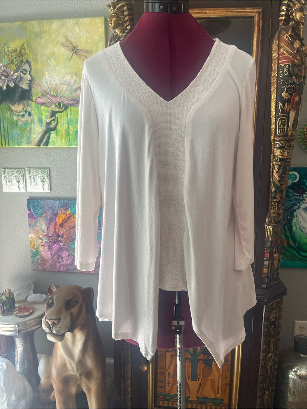White/Cream lightweight three-quarter length sleeve women’s top.